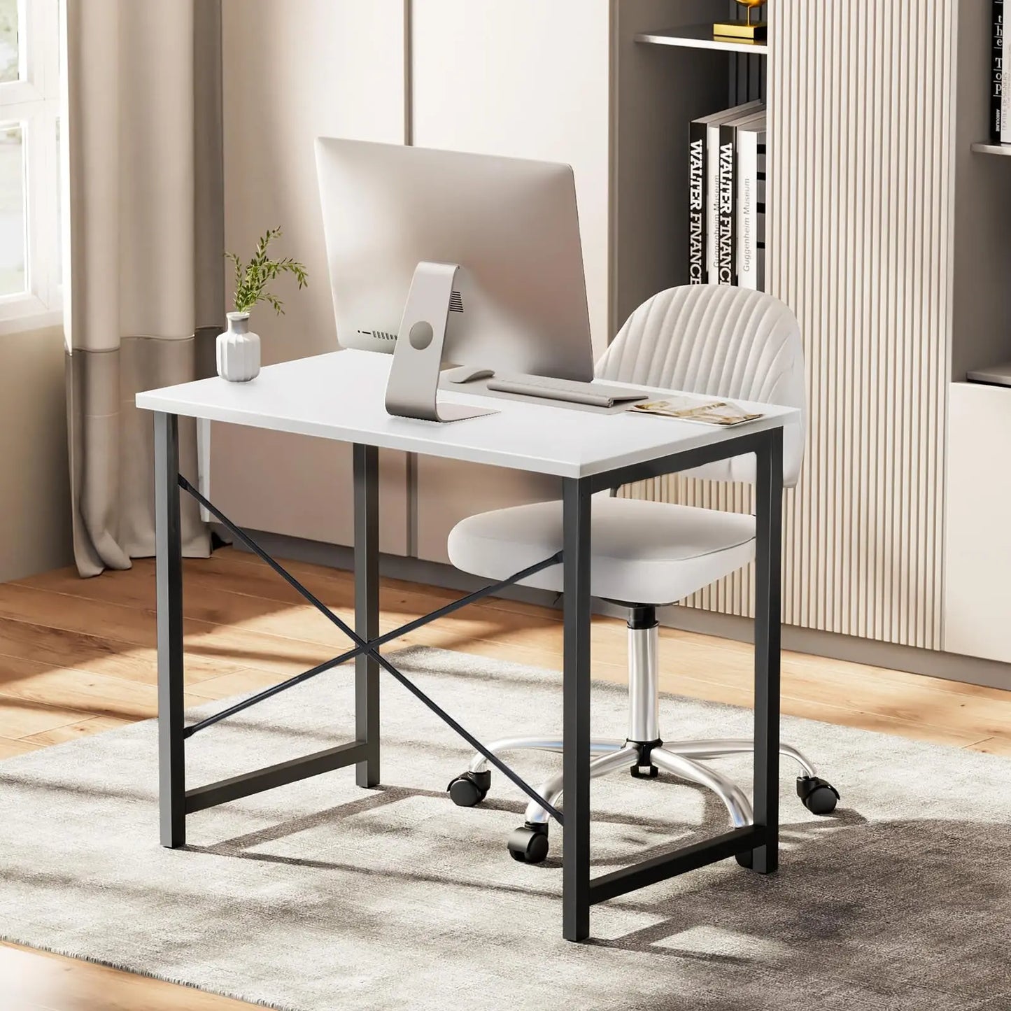 Modern home office setup with a desk, chair, and computer monitor.